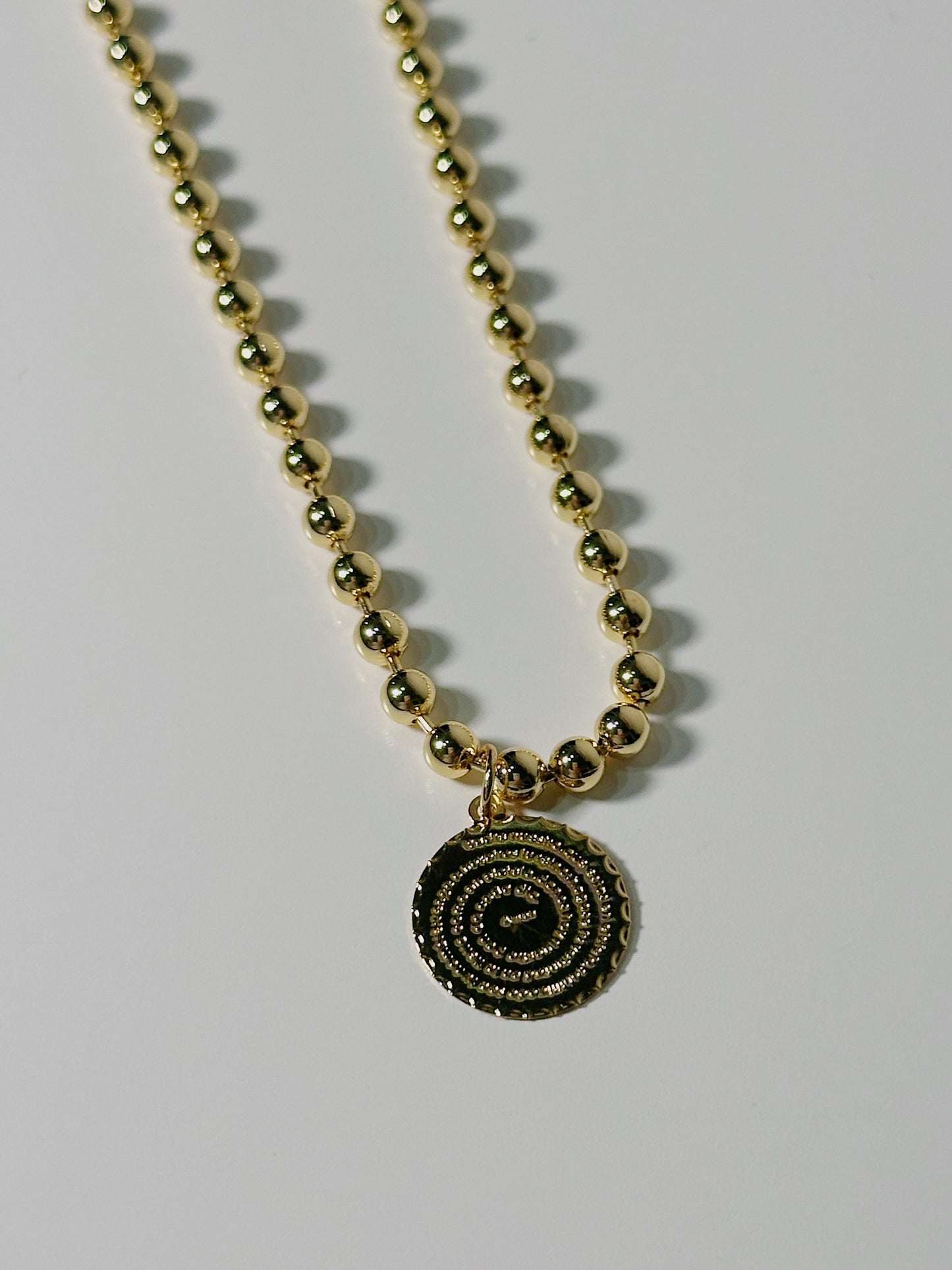 Medallón del Padre Nuestro